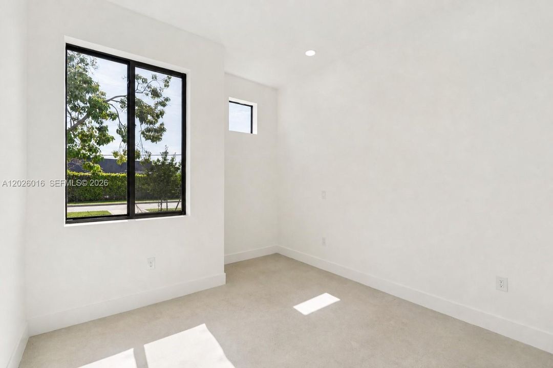 Photos shown are of a completed unit with the same layout and styling; the available unit is currently under construction and may vary.