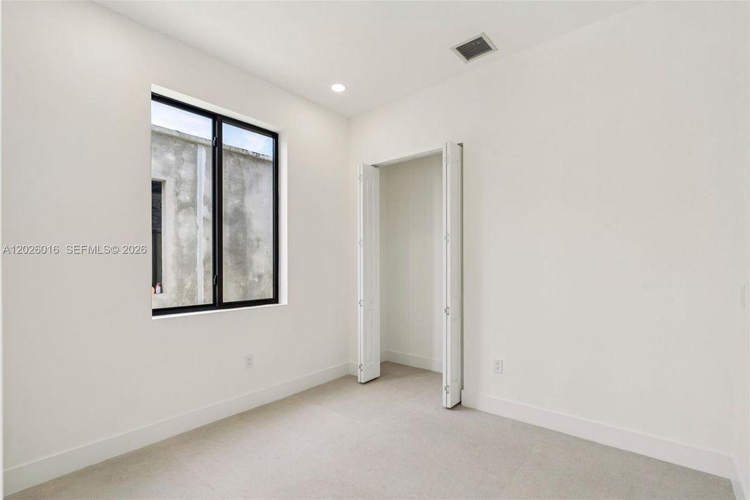 Photos shown are of a completed unit with the same layout and styling; the available unit is currently under construction and may vary.