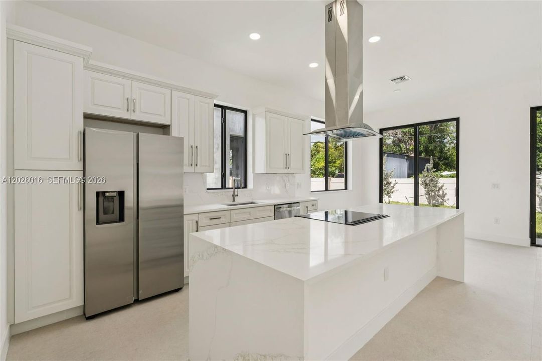 Photos shown are of a completed unit with the same layout and styling; the available unit is currently under construction and may vary.