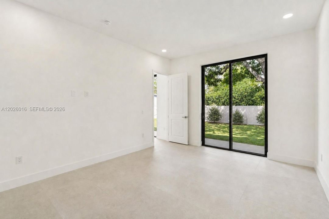 Photos shown are of a completed unit with the same layout and styling; the available unit is currently under construction and may vary.