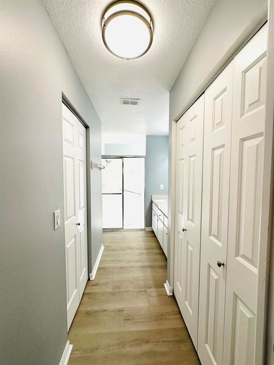 HALLWAY BETWEEN MASTER BEDROOM & BATH