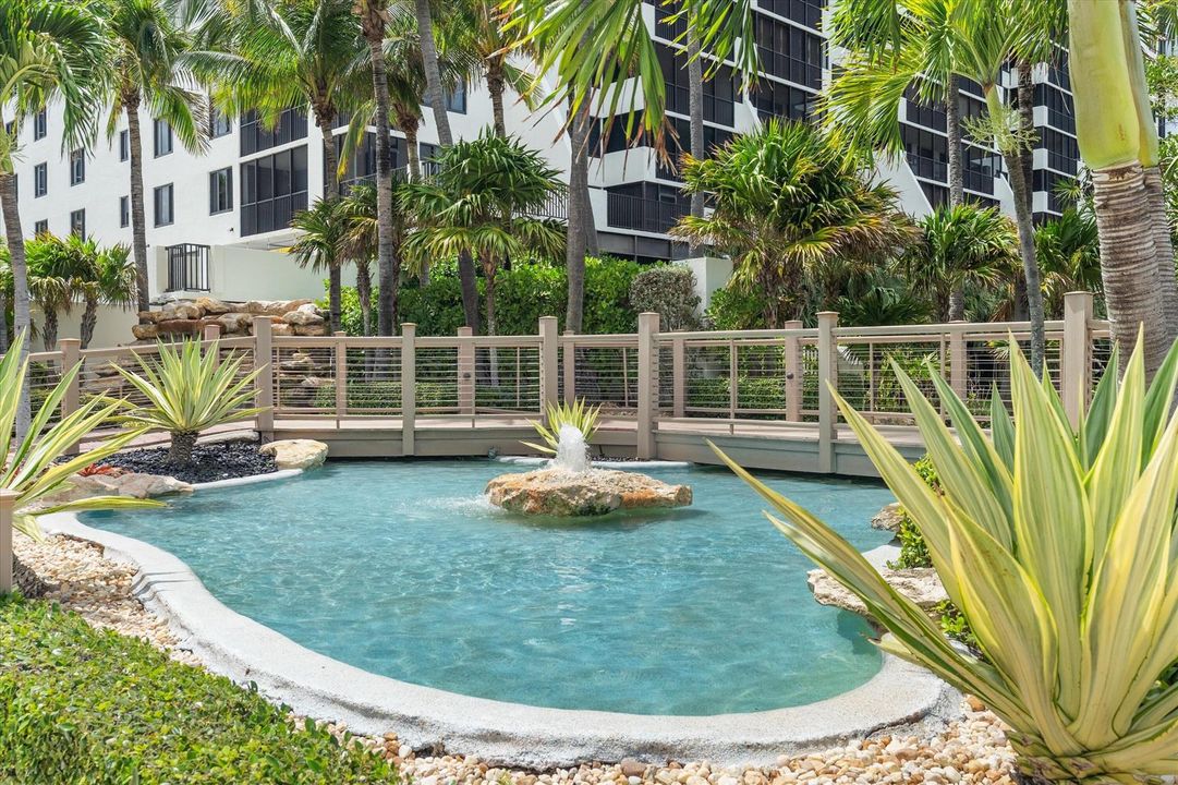 Two water falls and pond at entry