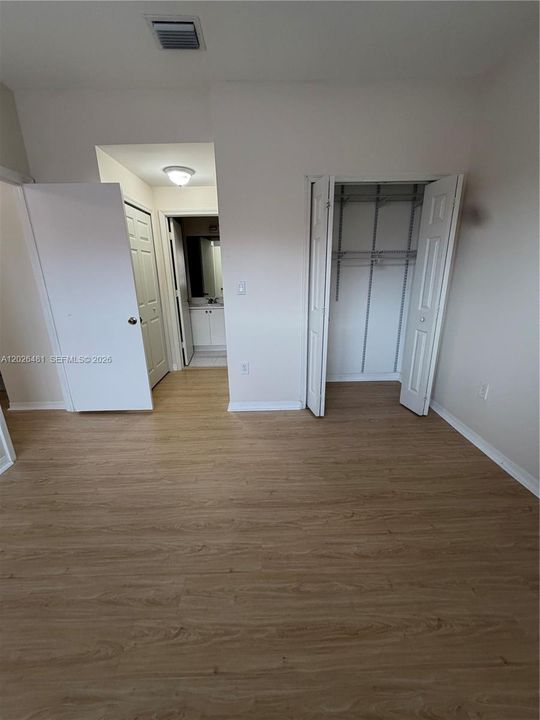 Master Bedroom, 3 closets and entrance to master bathroom