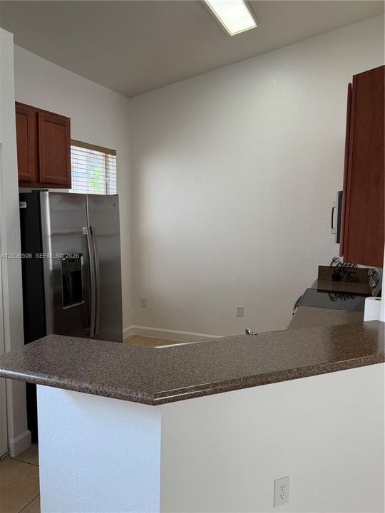 Nice sized kitchen with brand new stainless steel appliances.