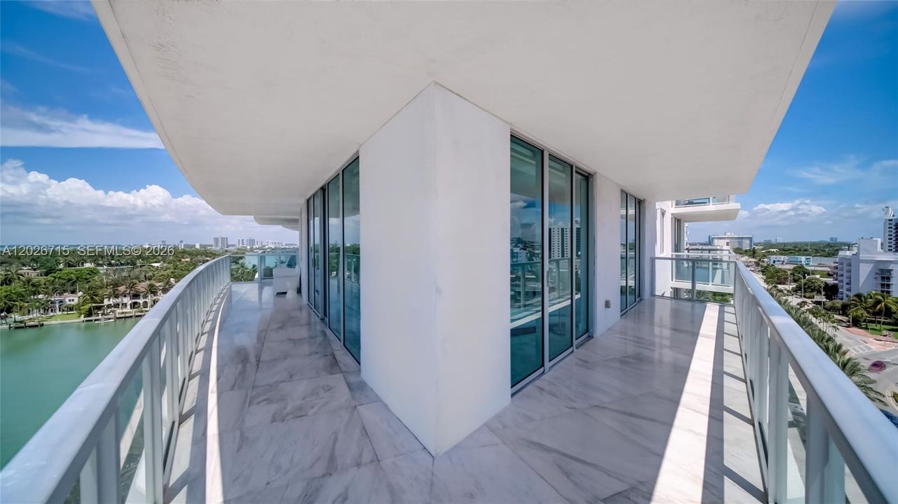 Wraparound balcony can be accessed through the master suite and second bedroom as well as the kitchen and living room.