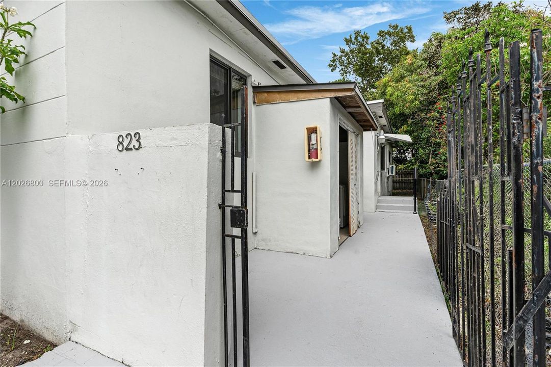 Entrance to 2/1.  Laundry Room Visible here