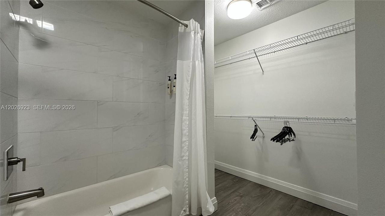 Guest bathroom/walk-in closet