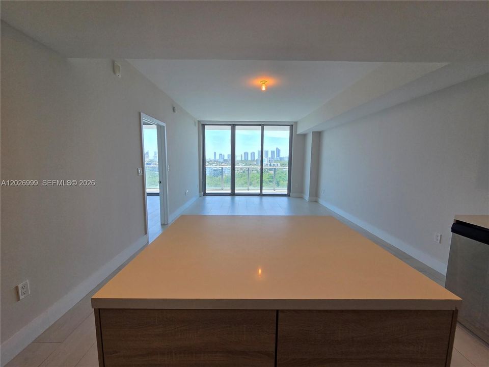 Kitchen Island view to the Living room