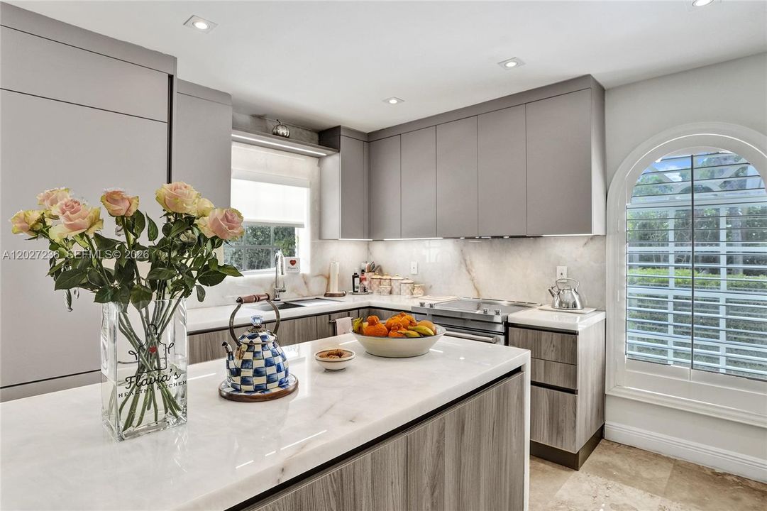 Kitchen has Quartzite countertops.