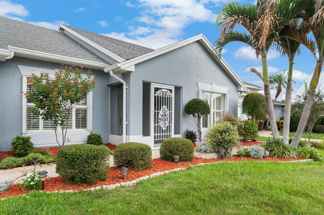 Landscaping wraps the home