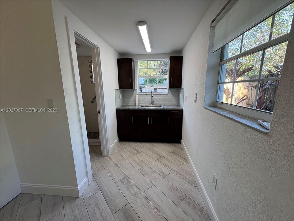 Looking onto kitchen area.