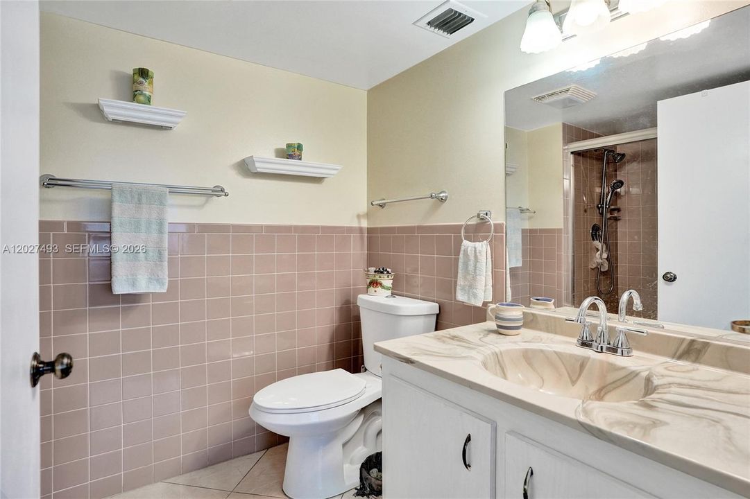 Includes a Walk In Shower with a Designer Door!