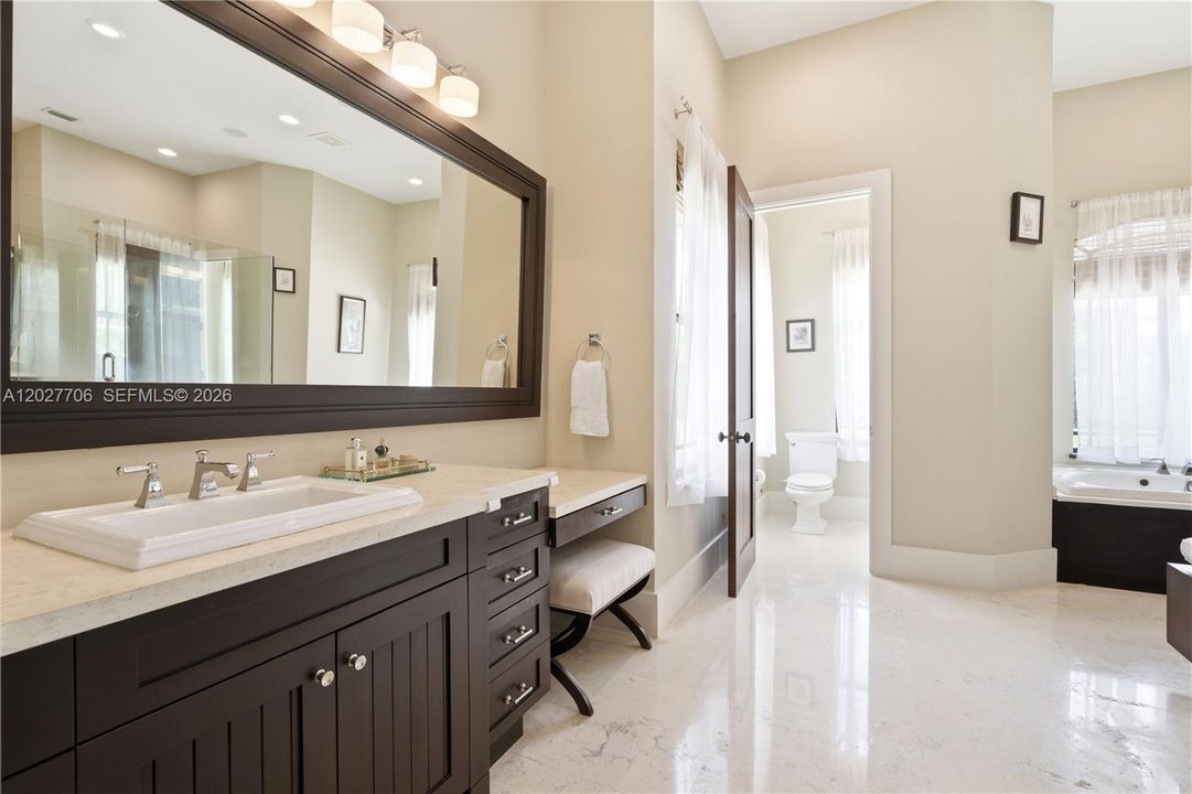 His & Hers sides, each with their own water closets