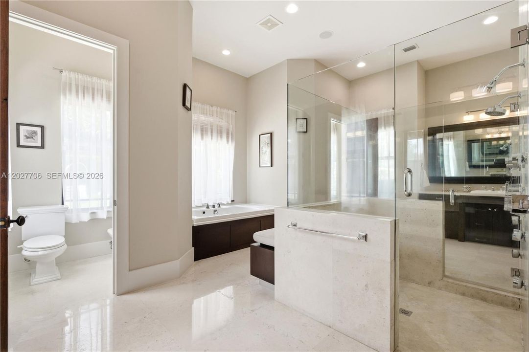 His & Hers sides, each with their own water closets