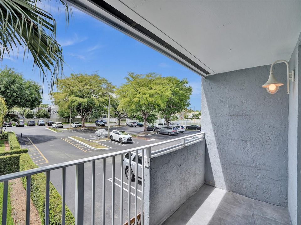 Enjoy S Florida sunshine and relax on your own balcony