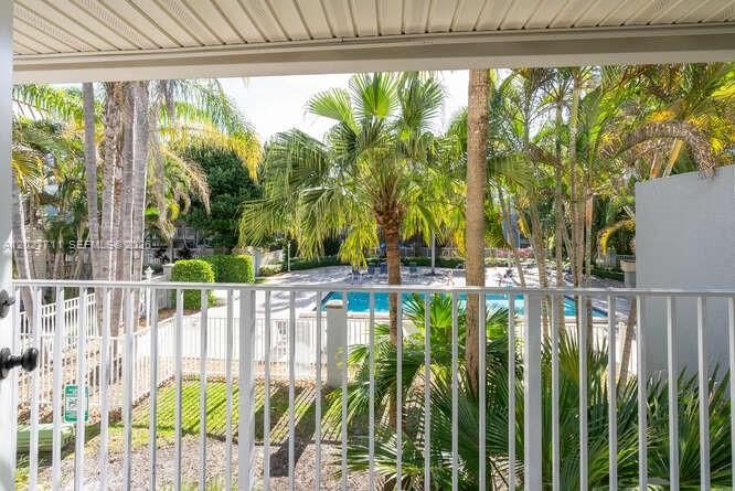 Enjoy S. Florida living at it's best in this sparkling pool and outdoor kitchen