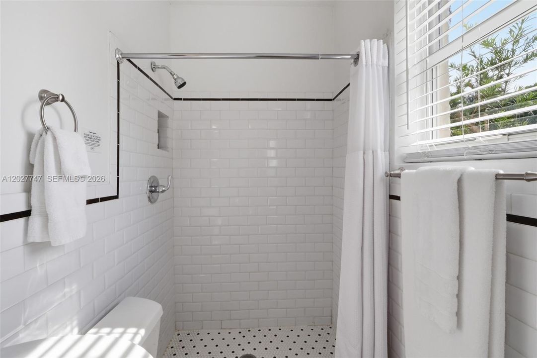 Classicly styled bathroom in the apartment.
