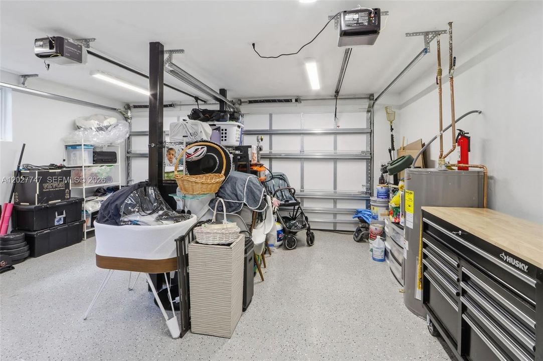 New split unit A/C for garage, water heater and insulated and impact garage door.