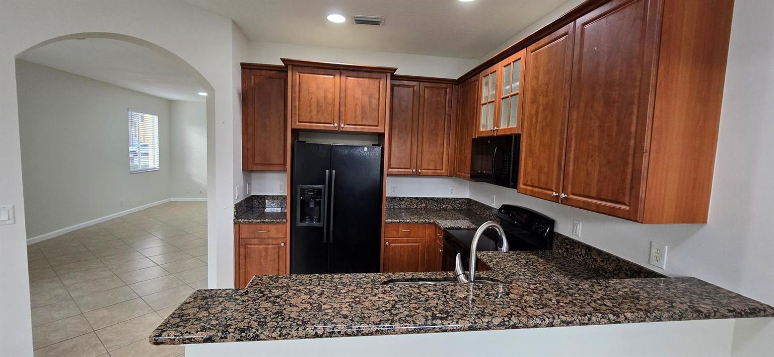 Kitchen granite counters flat top stove
