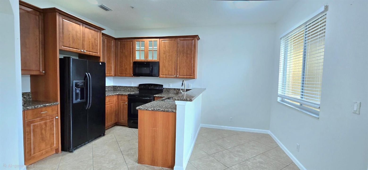 Kitchen with bar & lake view