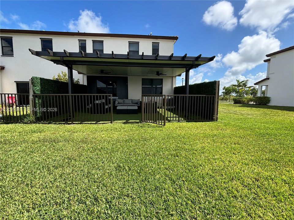 Enjoy outdoor living and entertaining under the spacious covered patio.
