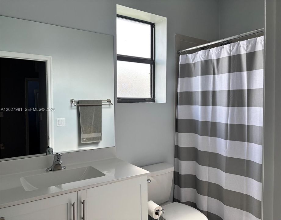 Guest/ kids bathroom with tub