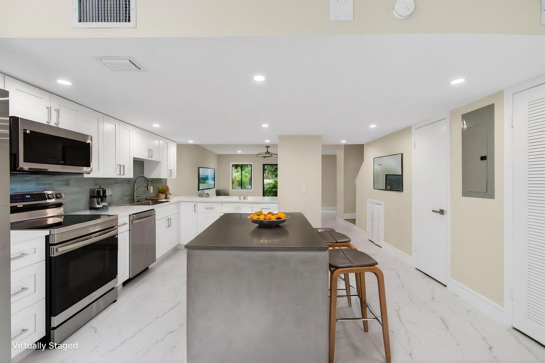 Virtually staged kitchen with island