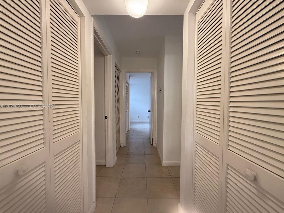 Hallway leading from bathroom 2 to secondary bedrooms