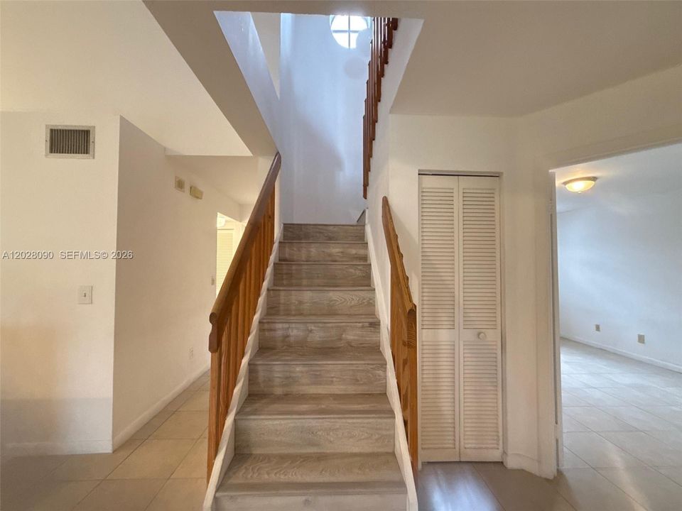 Staircase leading to the Primary Bedroom