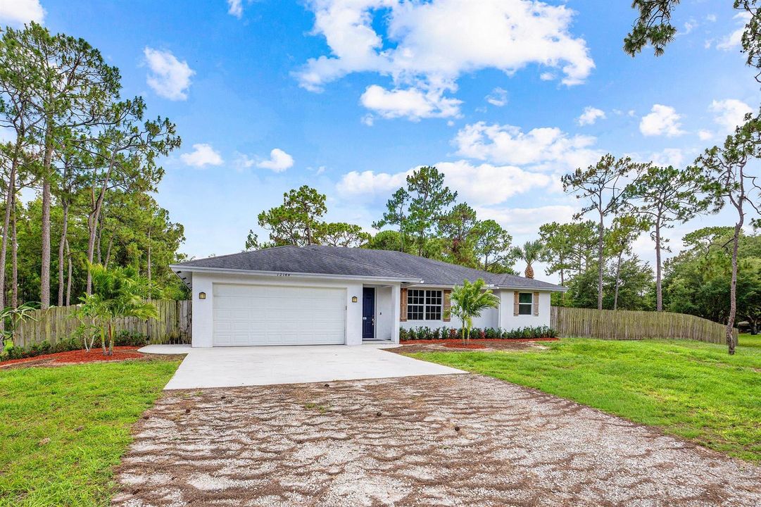 002-1214462ndLaneNorth-WestPalmBeach-FL-