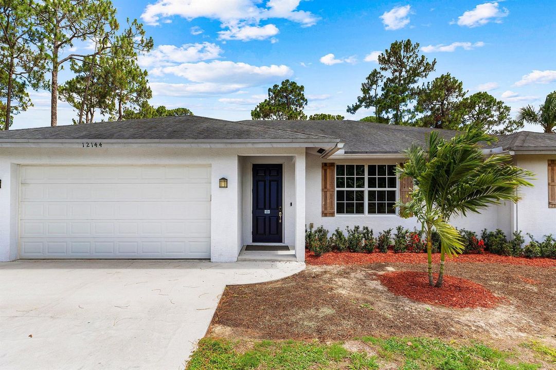 004-1214462ndLaneNorth-WestPalmBeach-FL-