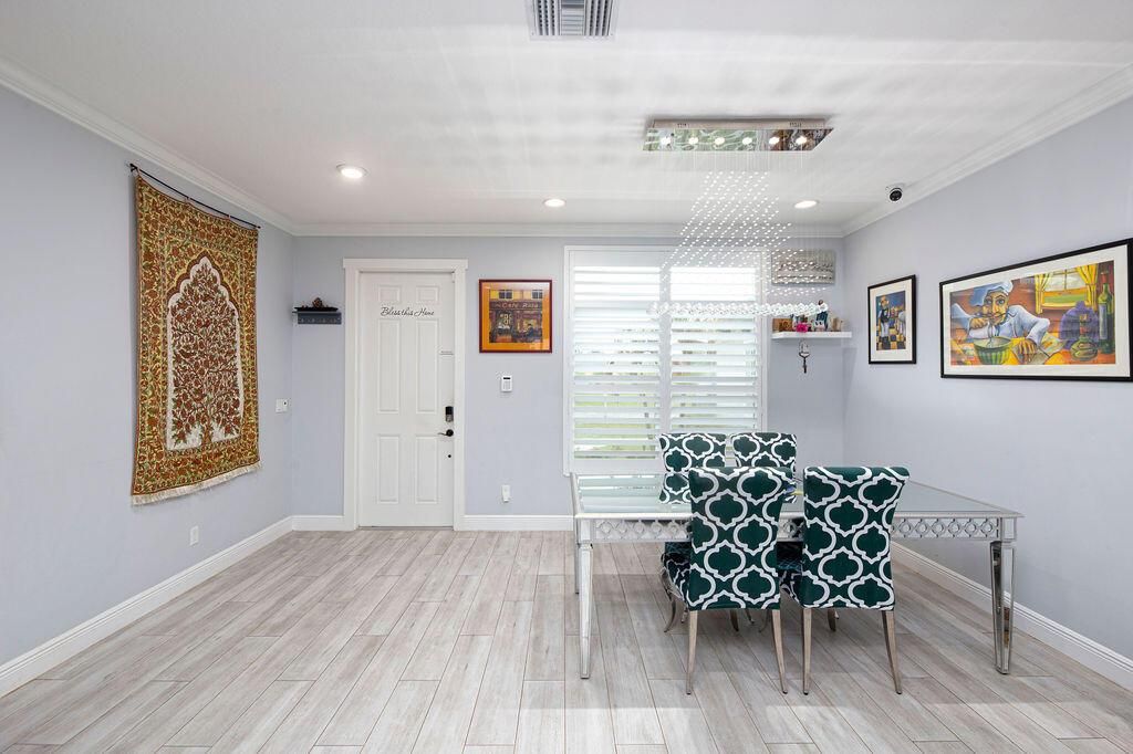 Front Door and Dining Room