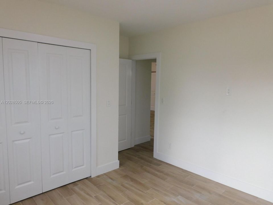 2nd Bedroom view to entry way.