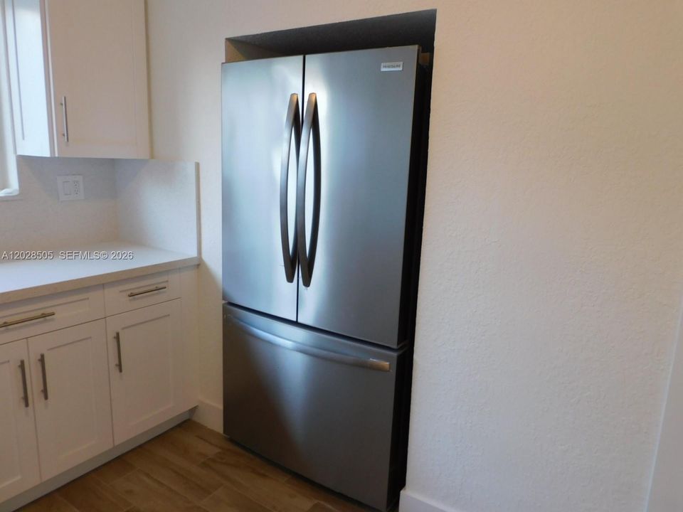 Newer SS Appliances in Kitchen.