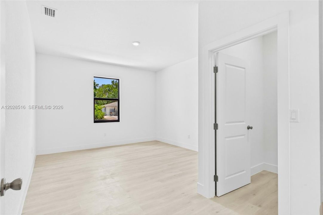 Spacious primary suite designed for comfort and relaxation.