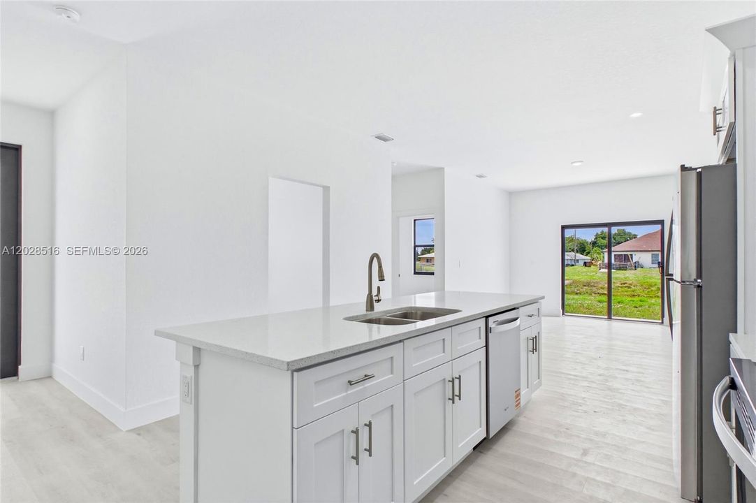 Stylish kitchen and living space designed with today’s lifestyle in mind.