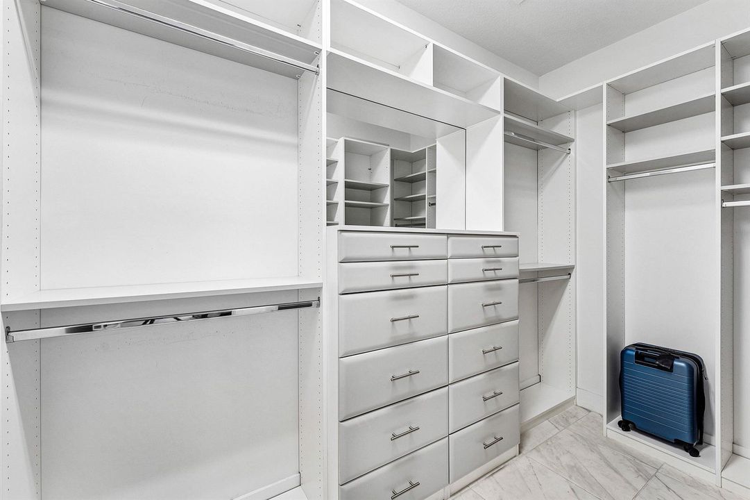 Primary Closet w Custom Built-Ins