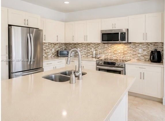 REFRESHED KITCHEN CABINETS. AI PHOTO