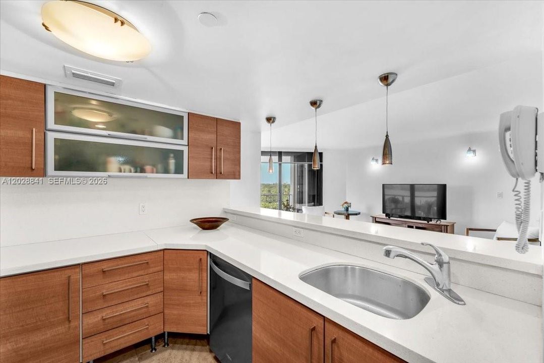 Experience the charm of a beautifully renovated open kitchen, perfect for entertaining friends and whipping up delicious meals.