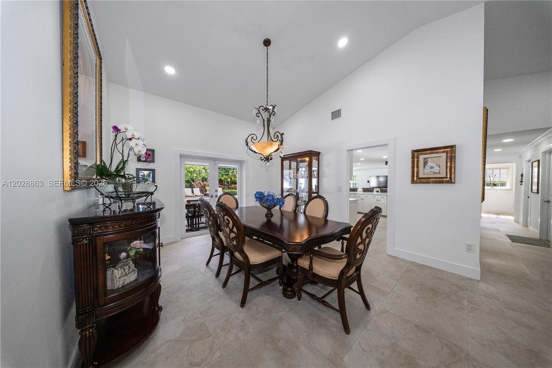 Dining area with nice views to the pool area and easy access to the kitchen.