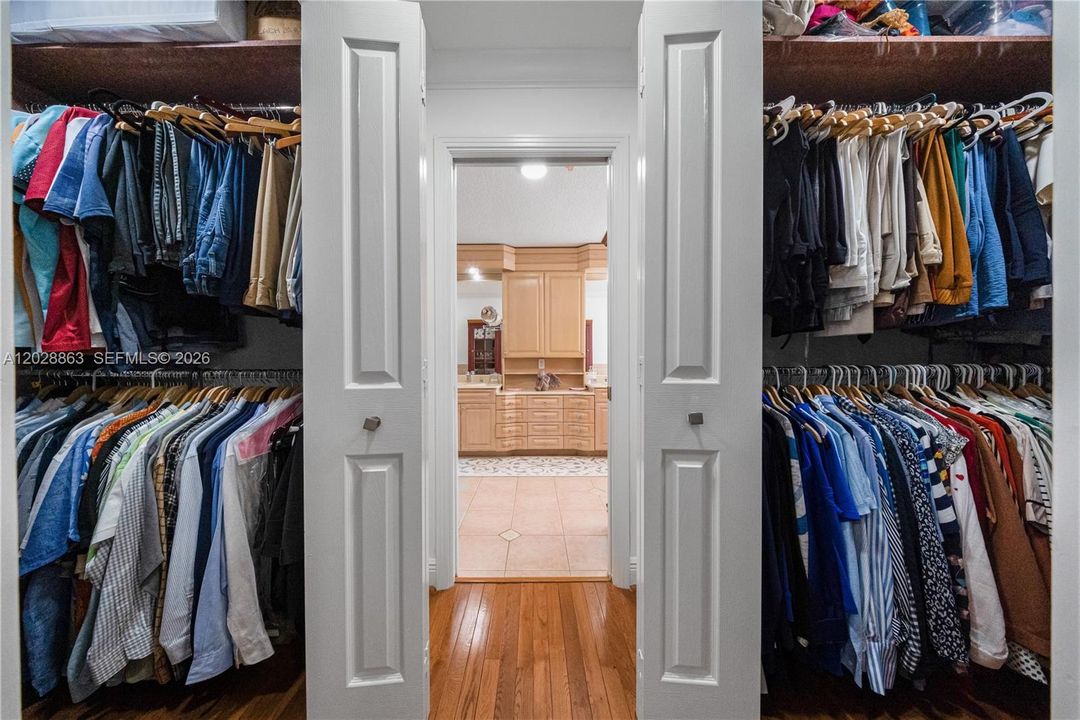 Primary bedroom with His/Hers walking closets.