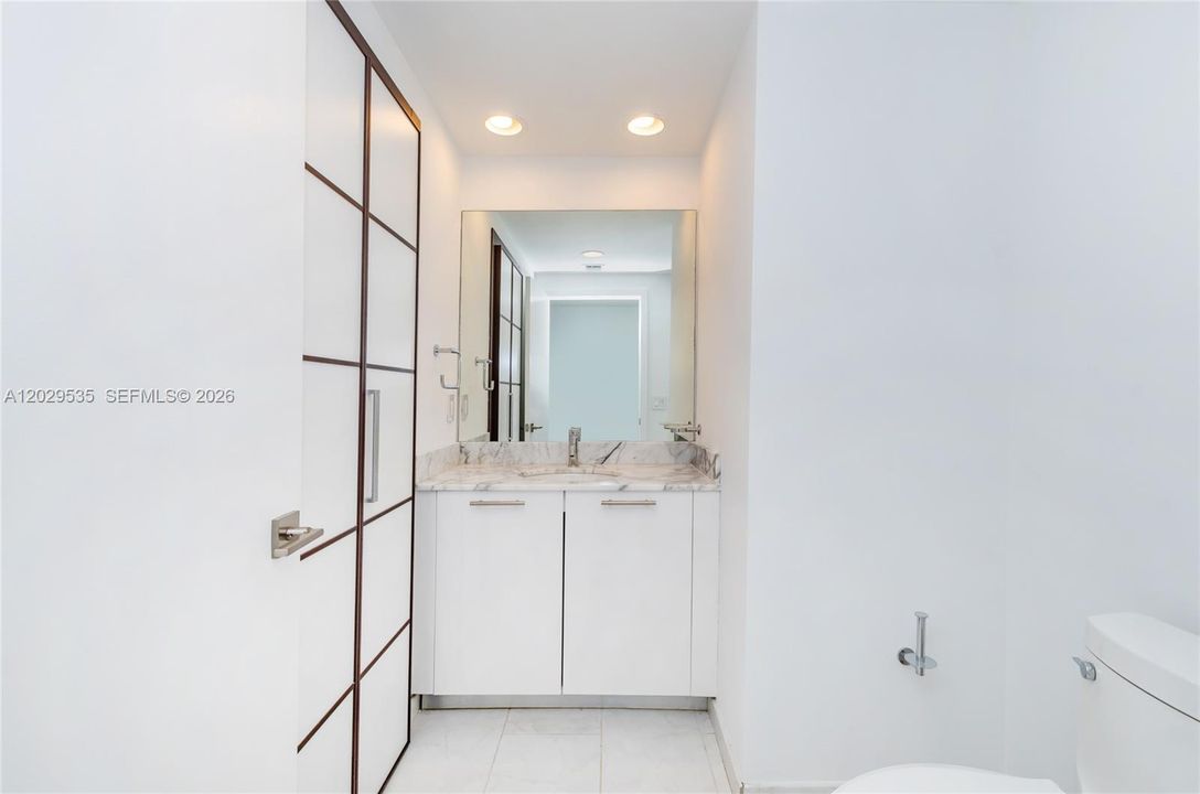 This Unit has 2.5 bathrooms. This is the social half bath