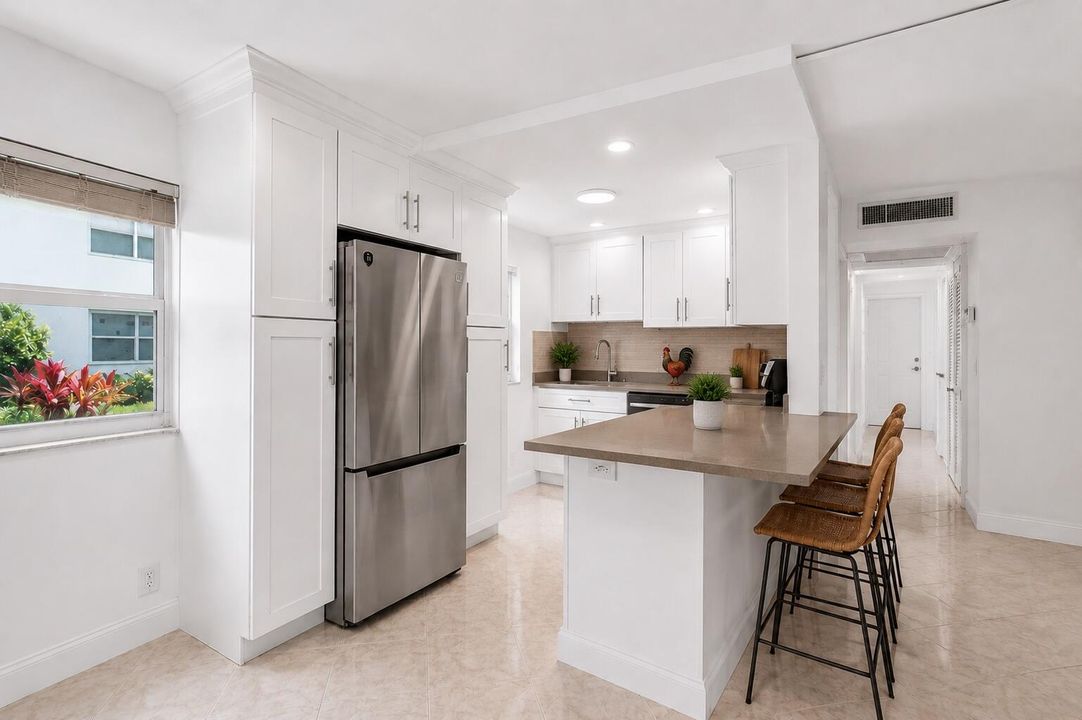 Kitchen and bar area virtually staged