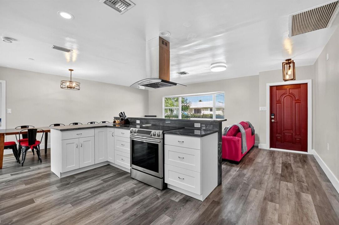 Lustrous luxury vinyl tile throughout