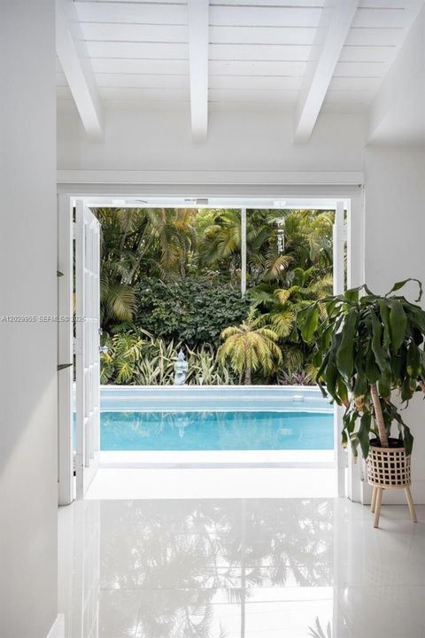 View from Living Room to Pool Area through French Doors