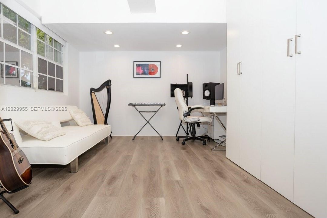 Den/Studio with Storage Cabinets