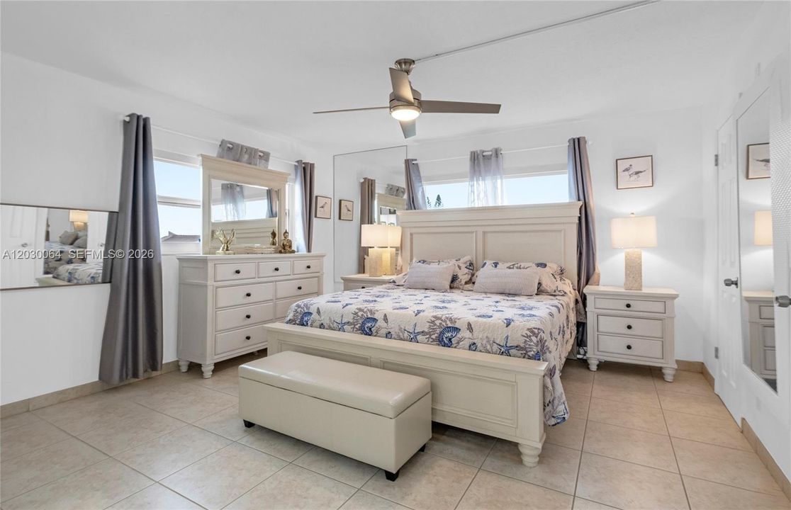 Main bedroom has a private access and 2 windos . Intracoastal and Ocean views