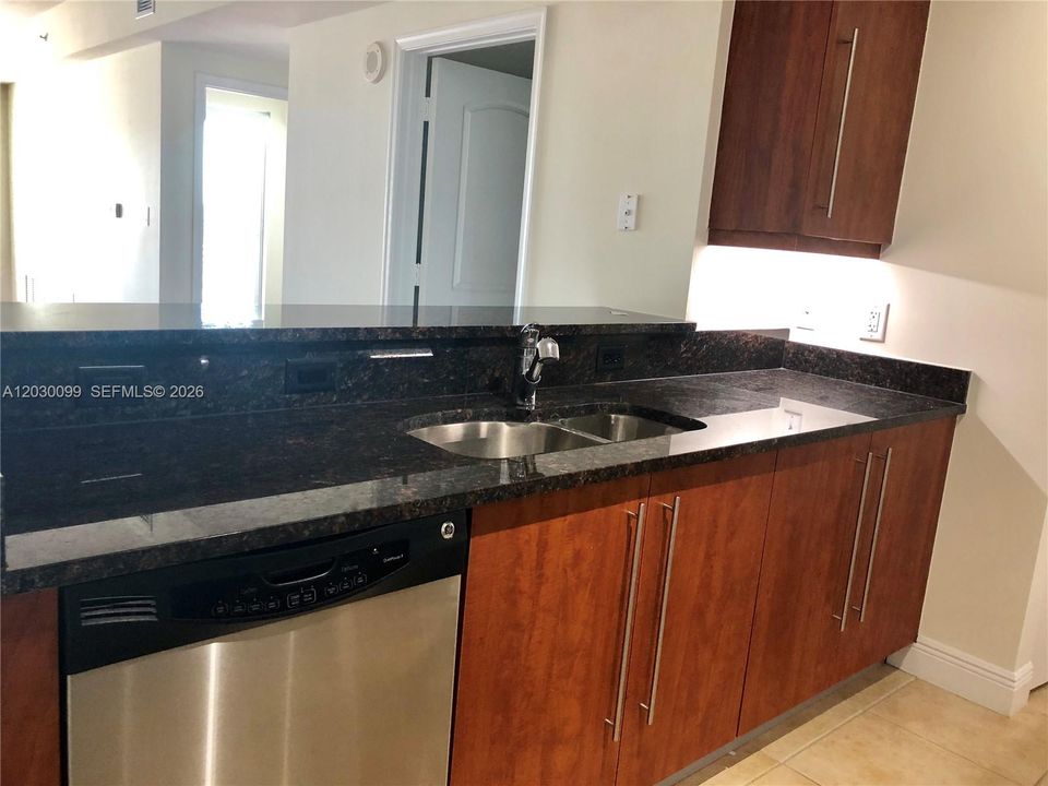 KITCHEN OPEN TO LIVING AREA