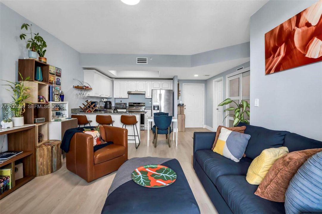Stylish modern living space with most furnishings included.