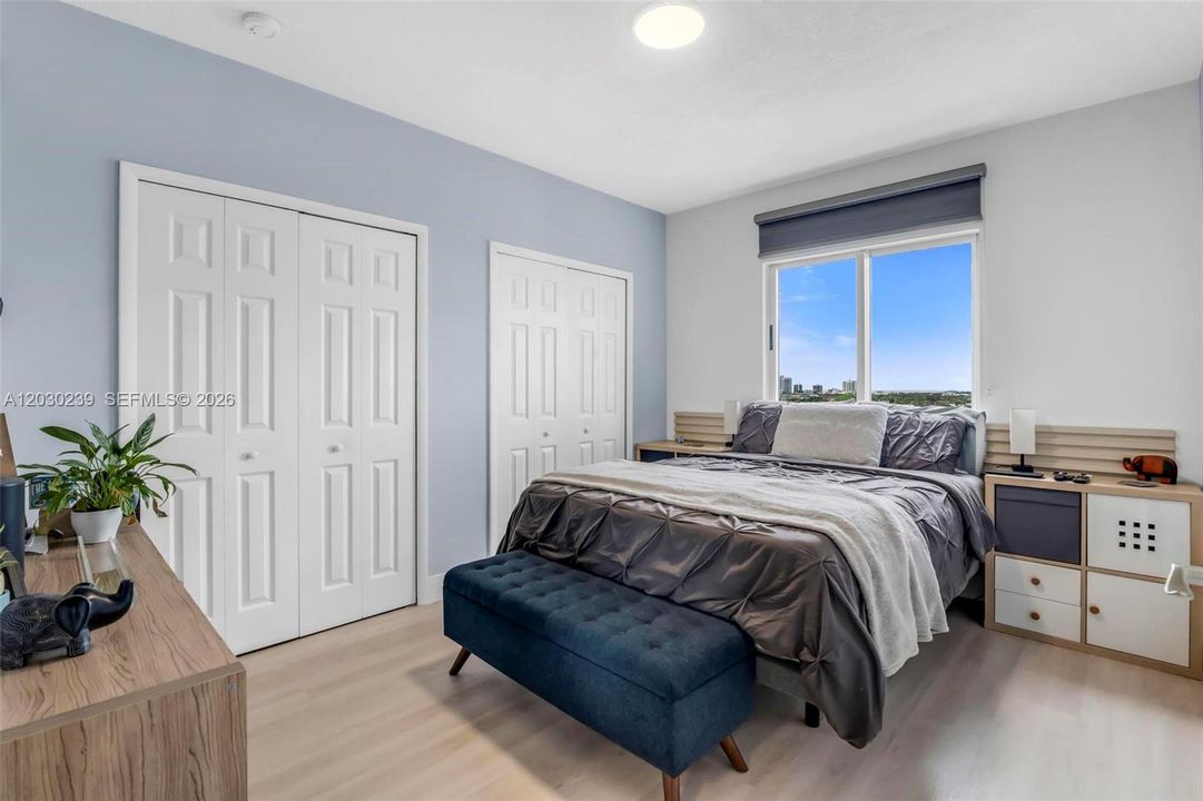 Spacious bedroom with wall-to-wall closet.